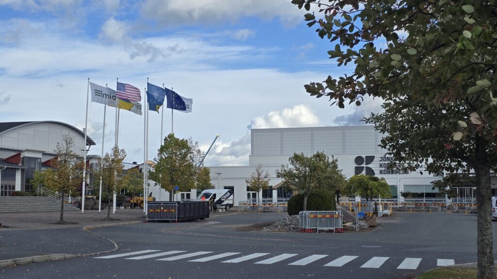 Elmia Congress Center building with flags in the foreground.